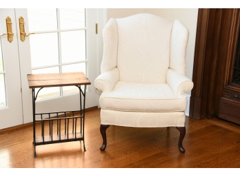 A White Side Chair With Side Table