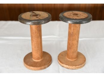 A Pair Of Wooden Spindles