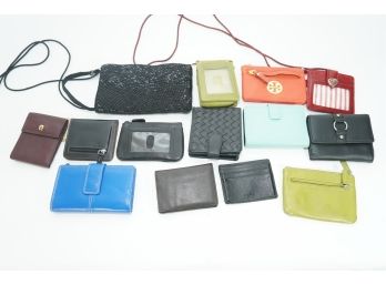 Collection Of Wallets Including Phone Bag