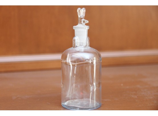 A Vintage Glass Medicine Bottle With Kangaroo Stopper