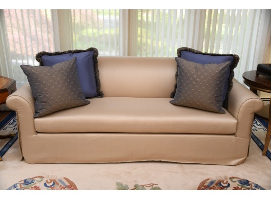 A Custom Silk Sofa With Coordinating Custom Silk Pillows