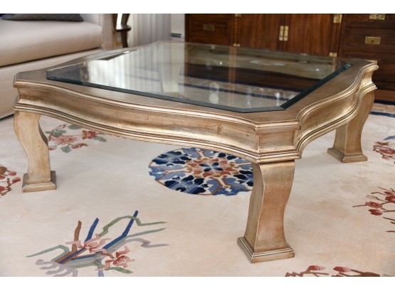 A Gold Tone Glass Top Coffee Table