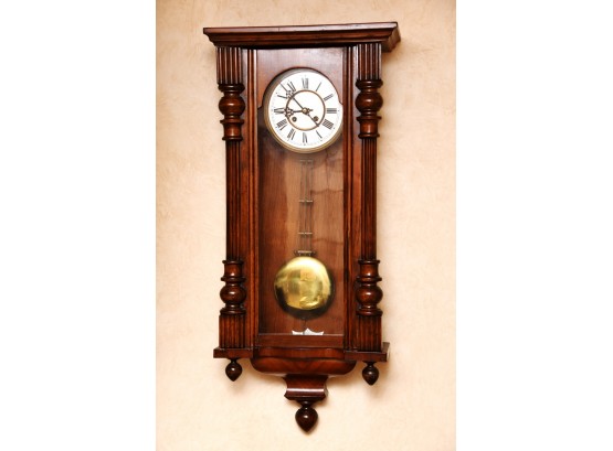 A Porcelain Face Antique Oak Pendulum Clock