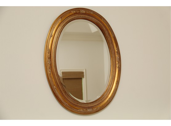 A Gold Gilt Oval Wall Mirror