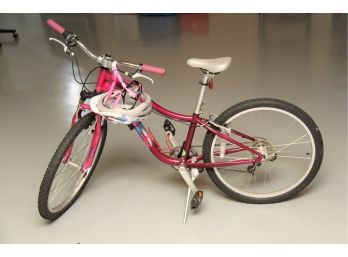 A Girl's Specialized Bicycle In Pink