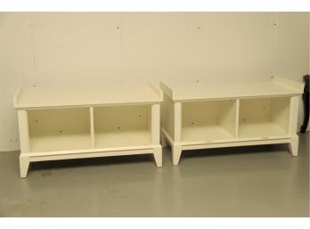 A Pair Of Small Egg Shell Colored Benches With Storage Compartments