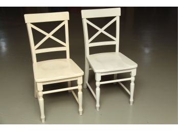 A Pair Of White Wood Chairs