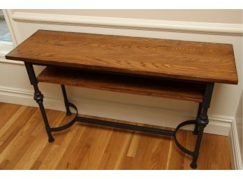 An Oak Top Wrought Iron Console Table With Shelf