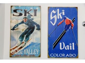 A Pair Of Wooden Skiing Themed Paintings