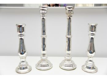 Set Of Four Glass Candlesticks