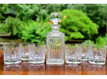 A Crystal Decanter With Crystal Rocks Glasses