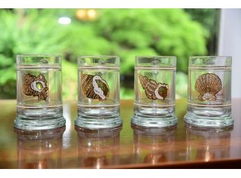 A Collection Of Gold Leaf Painted Shell Beer Mugs