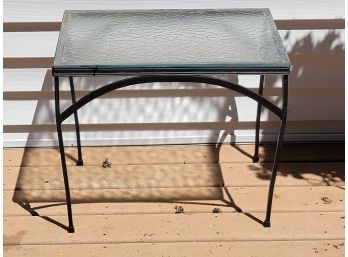 A Wrought Iron Glass Topped Outdoor Side Table