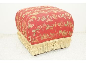 A Floral Gold Fringed Cushioned Ottoman