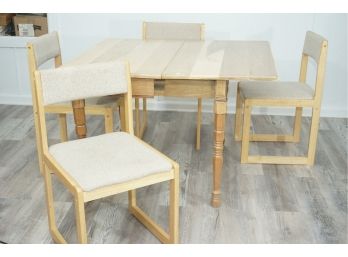 A Hand Made Flip Top Table And Set Of 4 United Parawood Cusioned Chairs