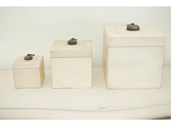 A Trio Of Wooden Boxes With Tassels
