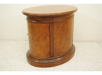 An Oval Oak Bar Cabinet