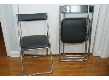 A Trio Of Fujiset Cushioned Metal Folding Chairs