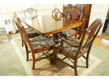 A Nigri Furniture Corp. Oak Double Pedestal Dining Table And Set Of 6 Chairs