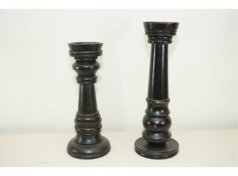 A Pair Of Wooden Candle Holders