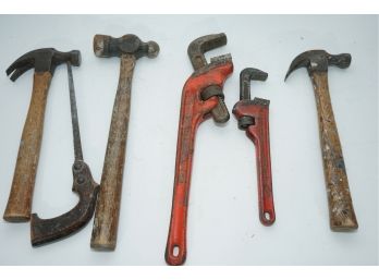 Group Of Hammers And Pipe Wrenches
