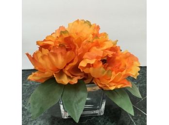 Orange Flower Arrangement In Glass
