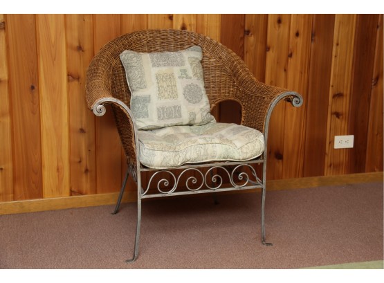 A Wrought Iron Side Chair With Rattan Detail