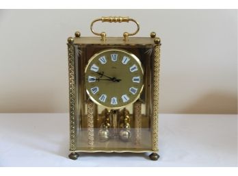 A Koma Brass Anniversary Mantle Clock