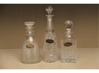 A Trio Of Vintage Crystal Decanters