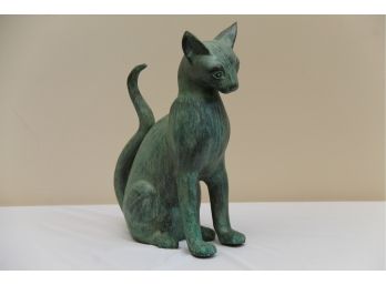 A Bronze Siamese Cat Sitting With Green Patina