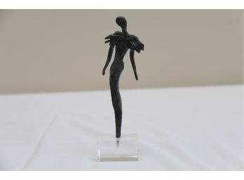 A Hand Sculpted Sophisticated Woman Sculpture On Lucite Base