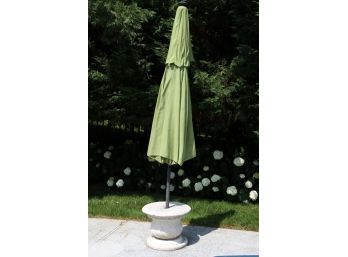 A Faux Stone Umbrella Stand Including Green Umbrella