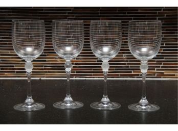 A Set Of Four Frosted Glass White Wine Glasses