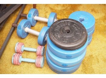 Group Of Weights Including Barbells