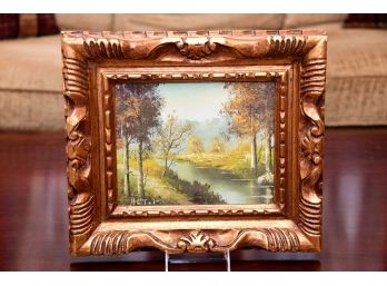 A Framed Oil On Canvas Fall River Scene Signed