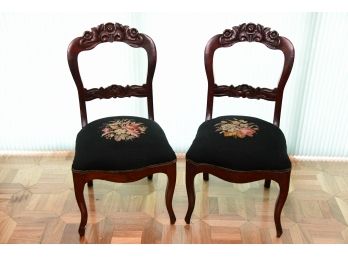 A Matching Pair Of Carved Needlepoint Side Chairs
