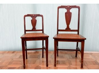 A Set Of Vintage Sibling Side Chairs