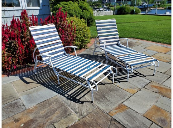 A Pair Of Strap Chaise Loungers