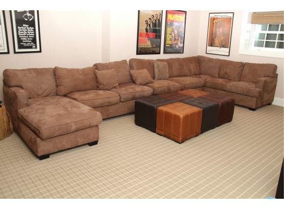 A Large Micro Suede 4 Piece Sectional With Sleeper