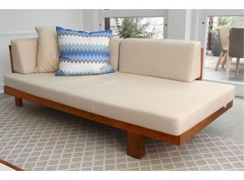A Tribu Teak Outdoor Right Facing Lounger With Janus Cushion Paid $5400