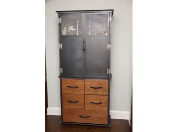 A Custom Co. Vintage Steel And Walnut Cabinet Paid $13,000