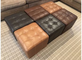 A Set Of 6 Ballard Design Leather Ottomans