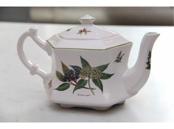 A Porcelain Floral Tea Pot By Crown Heritage