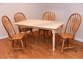 A Pine Dining Table With 4 Chairs