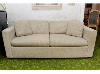 A Beige Tweed Sofa With Pullout Bed