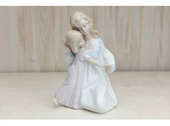A Paul Sebastian Porcelain Mother And Daughter Figurine