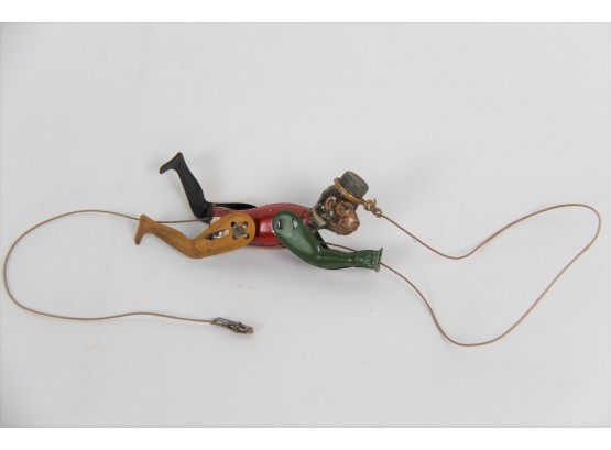Vintage Monkey On A String Tin Toy