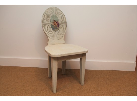 An Antique Wooden Chair With Cherub Painted Back
