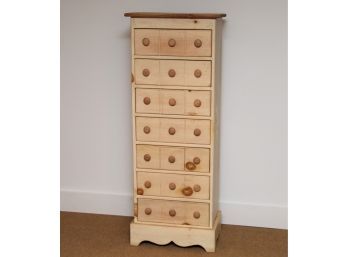 A Thin Natural Pine Chest Of Drawers