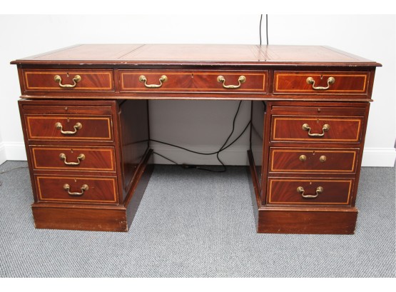 A Vintage Banded Mahogany Leather Top Executive Desk